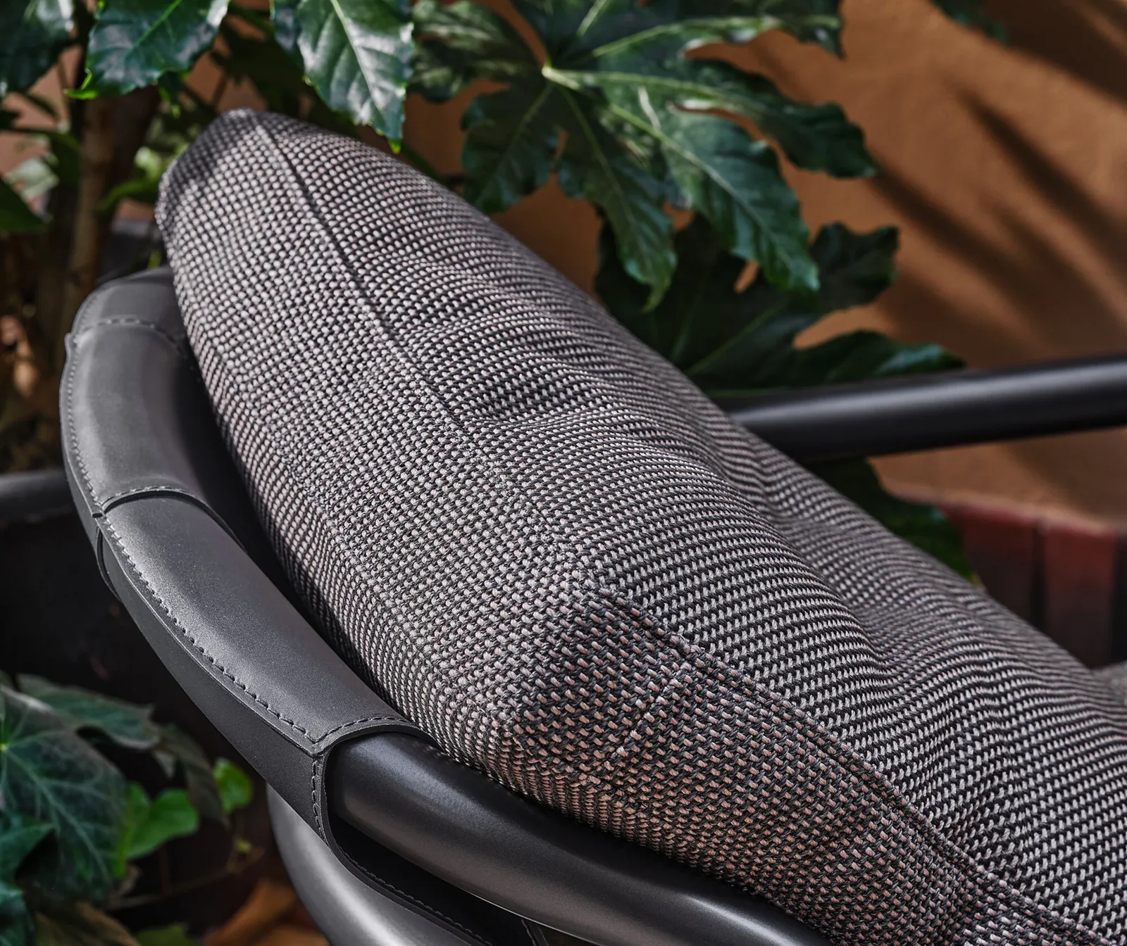 Flexform Alison outdoor armchair in a garden setting, frame 2