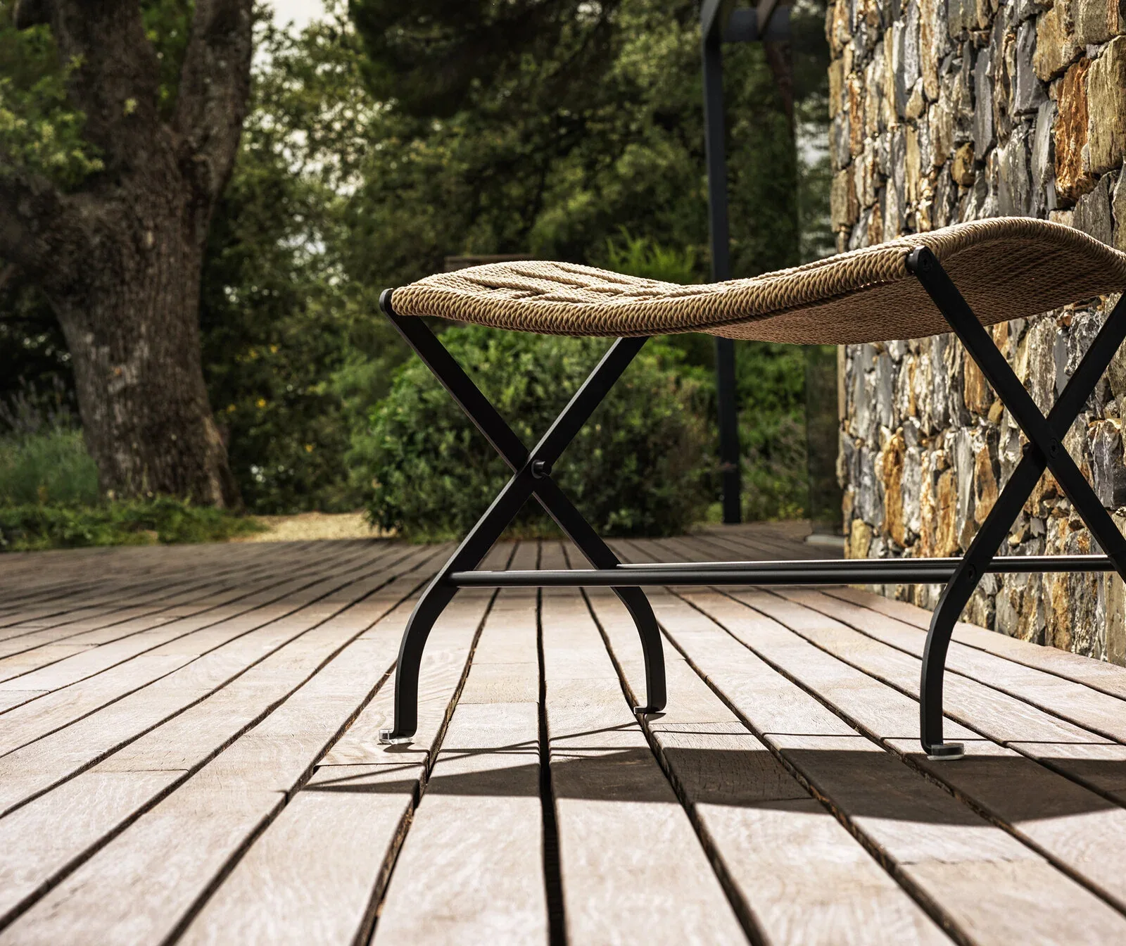Flexform Carlotta outdoor armchair in a garden setting, frame 2