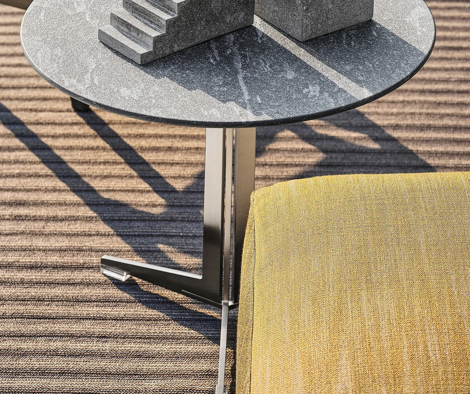 Flexform Fly outdoor coffee table in a garden setting, frame 2