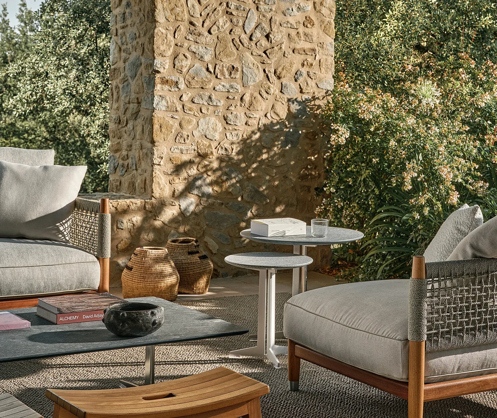 Flexform Fly outdoor coffee table in a garden setting, frame 4