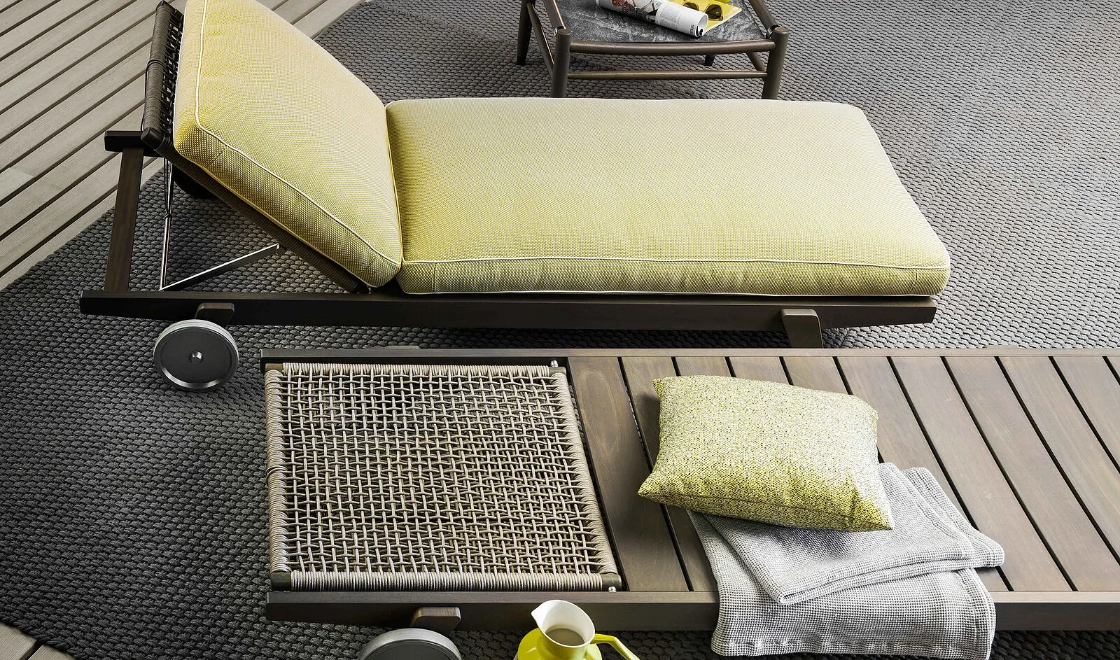 Flexform Hora Sexta outdoor daybed in a garden setting, frame 2